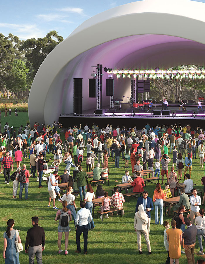 Artist render of a large group of people gathered in a park to watch a stage performance