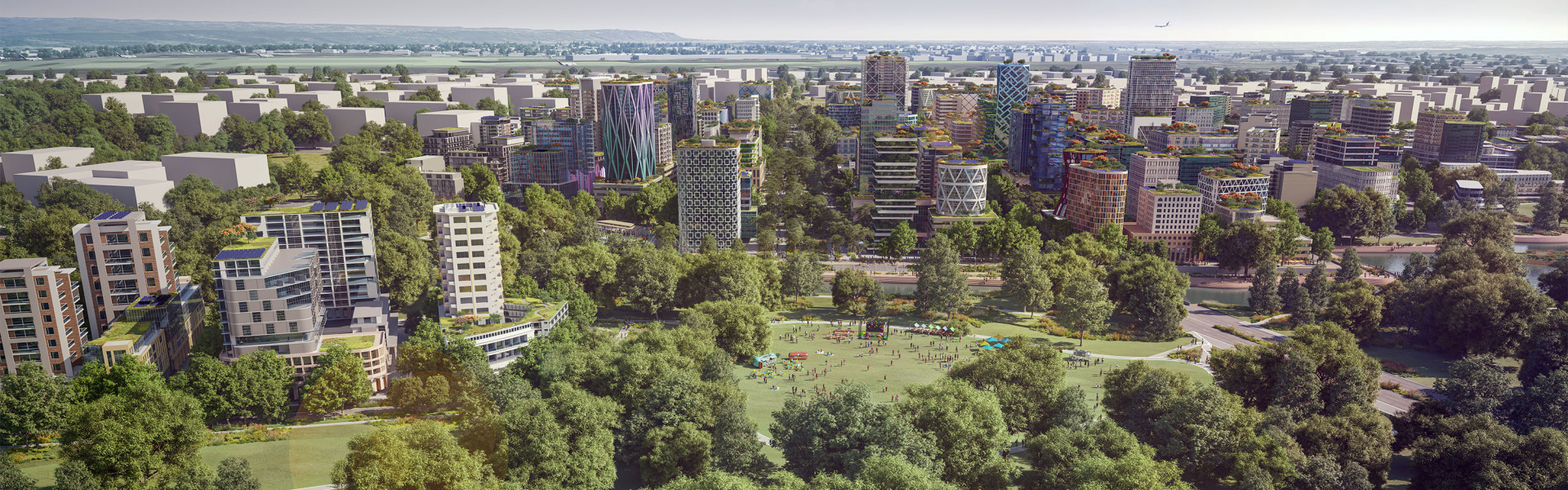 Artists render of Bradfield City Centre. Looking across an artist's impression of buildings in a city on a sunny day, with parkland in the foreground.